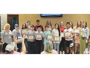 Above are Clear Creek Middle School’s top performing MathCon participants with teachers Darcie Pritchett and Allison Speece.
