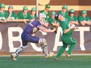 A Pickens base runner cannot escape the tag of Gilmer Bobcat catcher Brock Titus in game one last Tuesday.