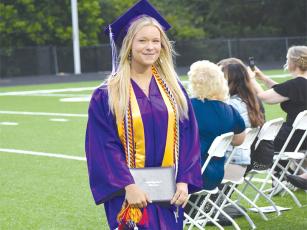 Laney Hensley receives her degree during graduation ceremonies held at Huff-Mosley Memorial Stadium Friday, May 26.