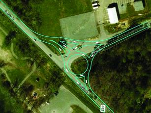 A conceptual drawing shows the possible layout of a proposed roundabout at the intersection of Legion Road and Old Highway 5. 