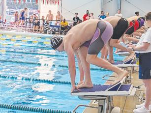 Gilmer High alum Law Lykins is pictured at a club meet last month. He is set to make his way to the University of Wisconsin — Oshkosh where he will swim for the Titans.