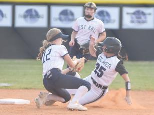 Senior A.J. Allen steals second, and she added two hits and scored two runs.