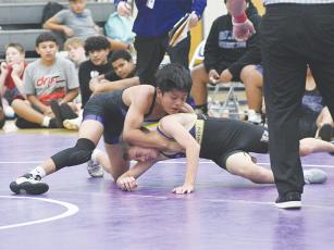 Clear Creek’s Jason Perez earned a victory by technical fall last week to aid the Bobcats’ win over Dawson County.