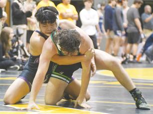 Bobcat senior Israel Francisco controls his Murray County opponent last Saturday. The Bobcats won the North Murray Duals and have a 14-4 record.