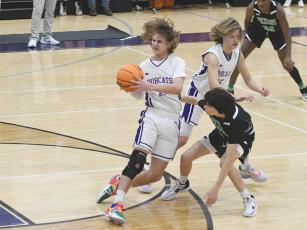 Clear Creek eighth grader Peyton Ocobock looks for an open teammate