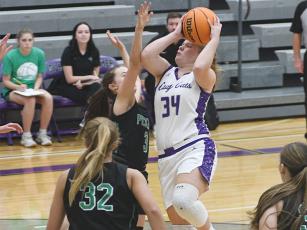 Gilmer senior Lucy Ray draws a foul versus Pickens last Tuesday and scored 13 points when the Cats met Fannin County four days later.