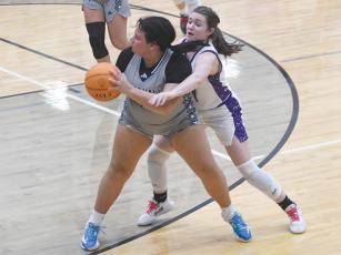 Gilmer High senior Marley Boatwright applies full-court pressure against West Hall. She scored 14 points in the victory.