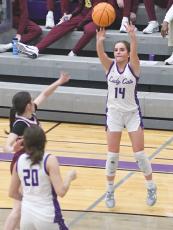 Lady Cat Bree Burnette fires a three pointer last Tuesday versus Dawson County.