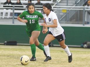 Gilmer High School’s Amalia Perez Escobar dribbles downfield and scored two goals for the Lady Cats last week. 