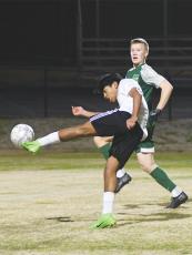 Gilmer’s Brayner Ortiz fires a shot for the Bobcats’ first goal after receiving a 40-yard free kick from Jorge Flores versus Murray County last Thursday. 