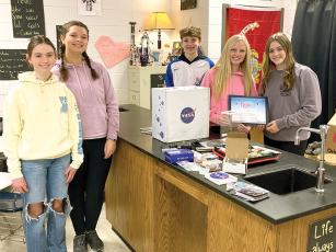 Clear Creek Middle School students Alexandra Shull, Kloe McFarland, Andrew Chastain, Jilly Burnette and Presley Chancey with the prize box they received as one of 60 winning teams in the NASA TechRise Student Challenge.  