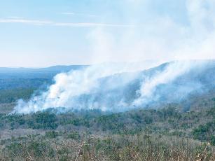 Reader Suzanne Hughes took this photo of a recent controlled burn looking from Rainbow Mountain toward the Owltown Mountain area. 
