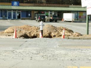 The depth of contractor-dug trenches that were cut across South Main Street for fire hydrant connections drew concern from the Ellijay-Gilmer County Water Authority following recent storms.  