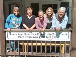 From left, volunteers Sally Dowling, Betty Turcan, Adrianna Ernst, Emmie Lee and Cathy Vincent are shown at the Cherry Log Christian Church Clothes Closet, which will add Saturdays to its operating schedule starting April 6. 